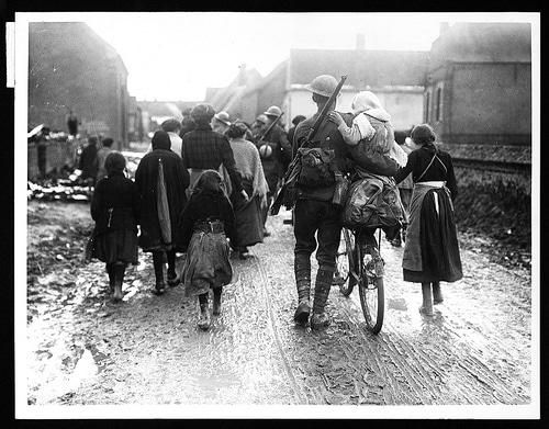 British soldiers arriving in a village, during World War I