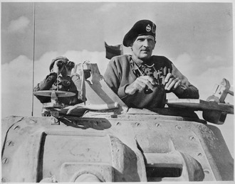 General_Bernard_L._Montgomery_watches_his_tanks_move_up._North_Africa,_November_1942._-_NARA_-_535939.tif