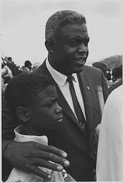 Civil_Rights_March_on_Washington,_D.C._Former_National_Baseball_League_player,_Jackie_Robinson_with_his_son.,_08_28_1963